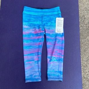 NWT Reversible Twolu Ivivva Rhythmic Crop Size 12